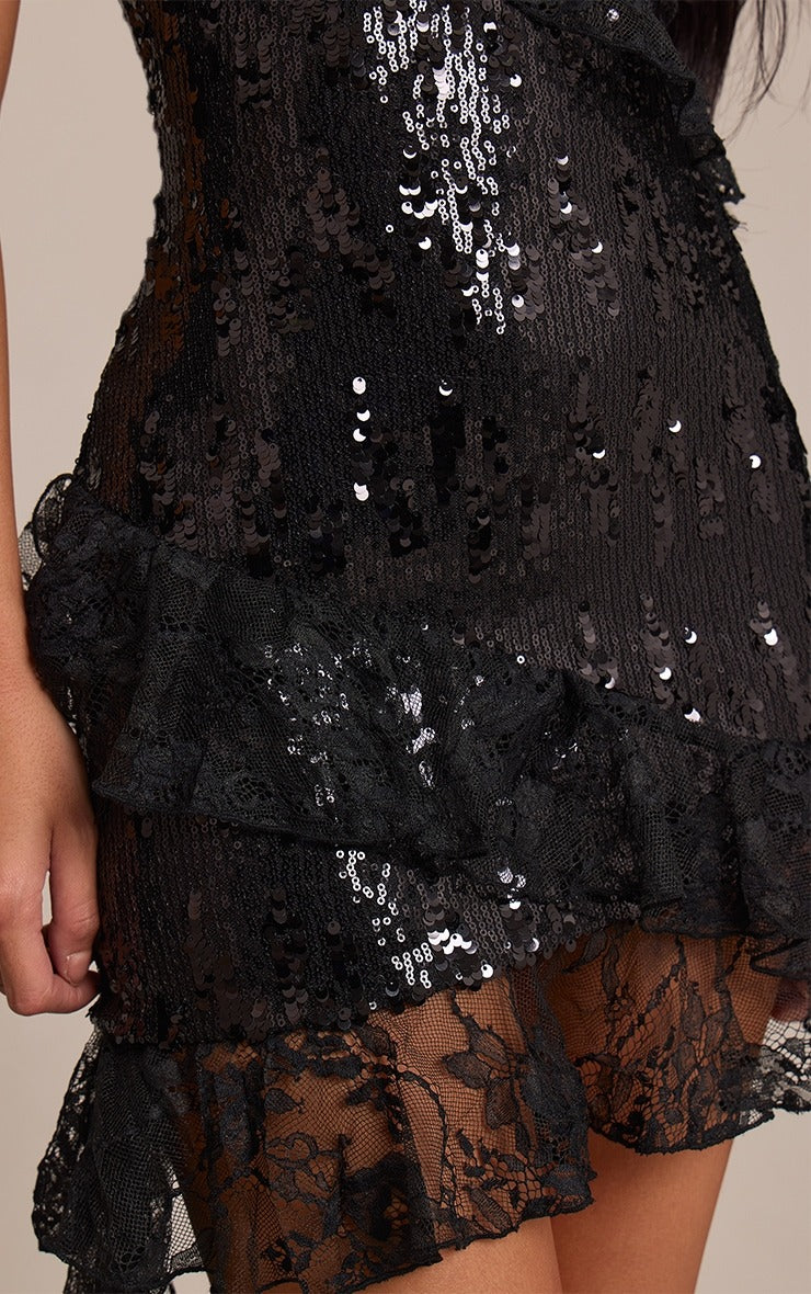 Robe mini noire scintillante col V